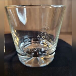Johnny Walker set up two whiskey glasses
